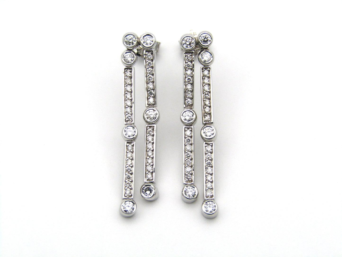 18K gold diamond drop earrings.