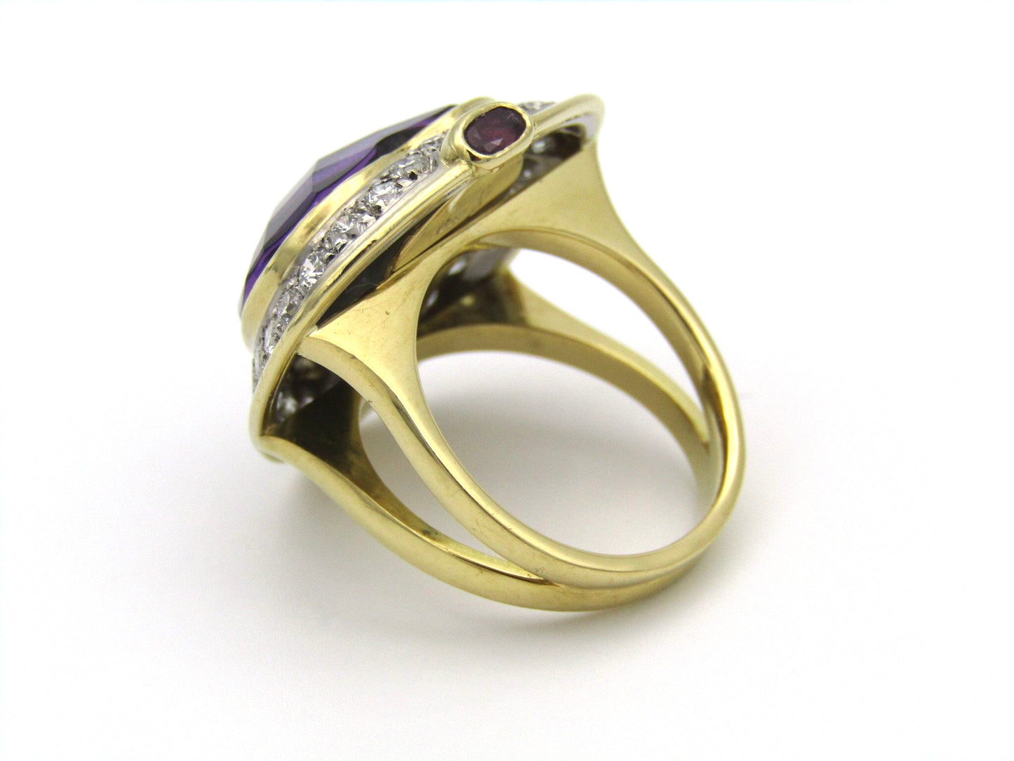 18kt gold amethyst, diamond, and ruby ring.