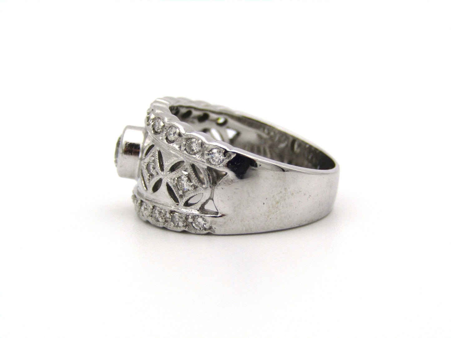 18kt gold diamond ring by Jenna Clifford.