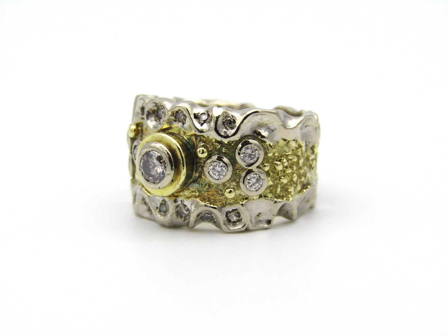 18kt gold diamond ring.