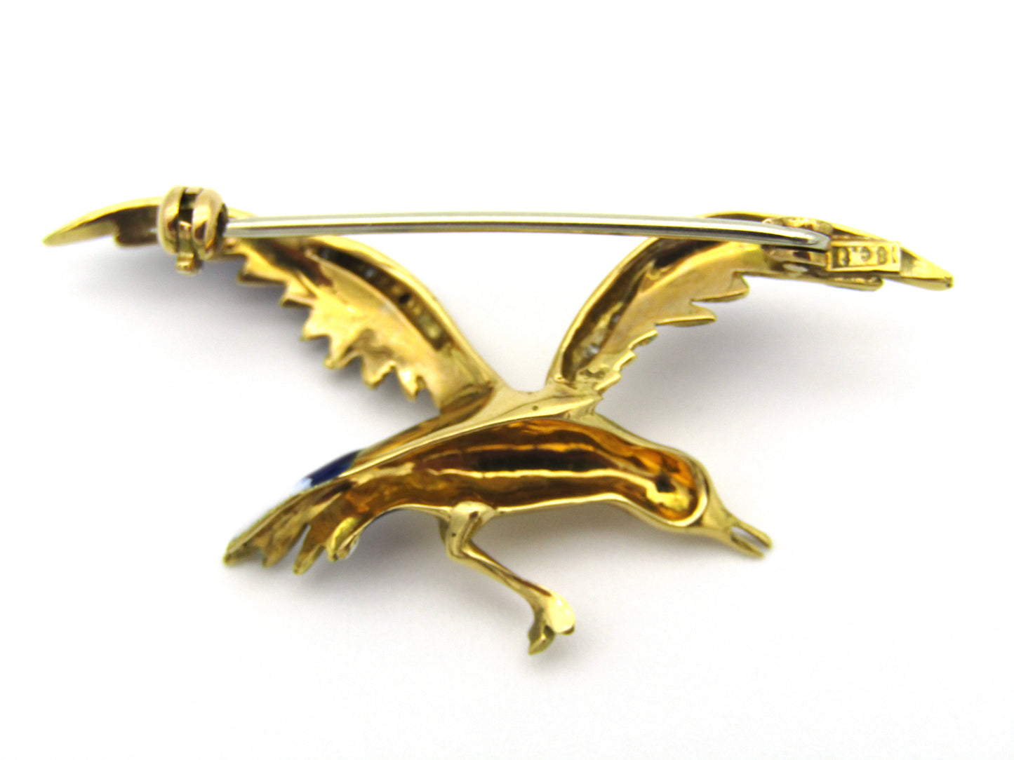 18kt gold diamond and enamel "Bird in flight" brooch.