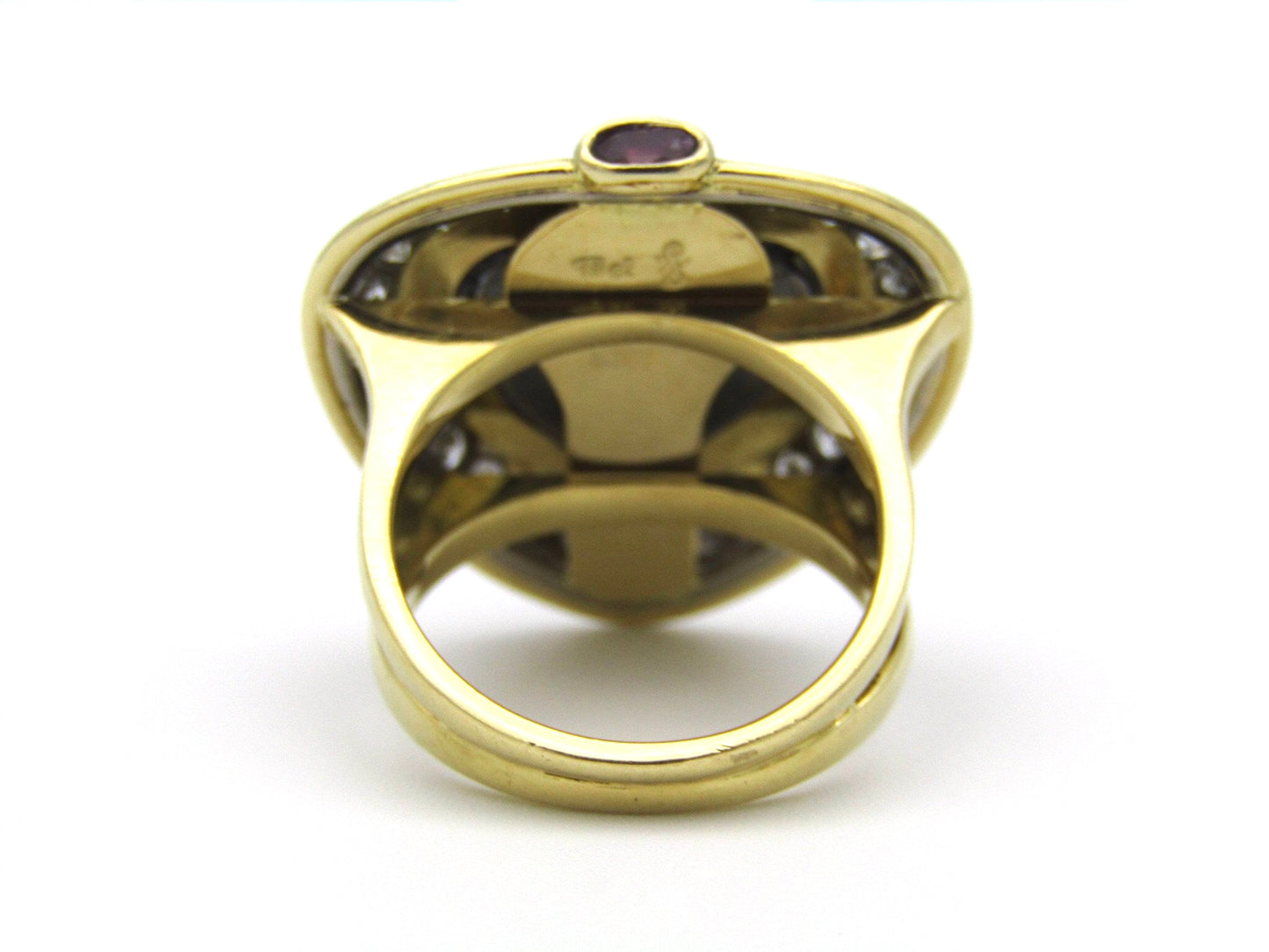 18kt gold amethyst, diamond, and ruby ring.