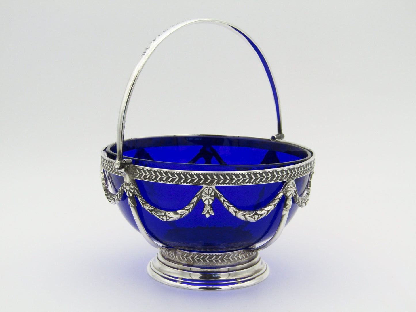 A Victorian silver sugar basket by Horace Woodward & Co., Birmingham, 1881.