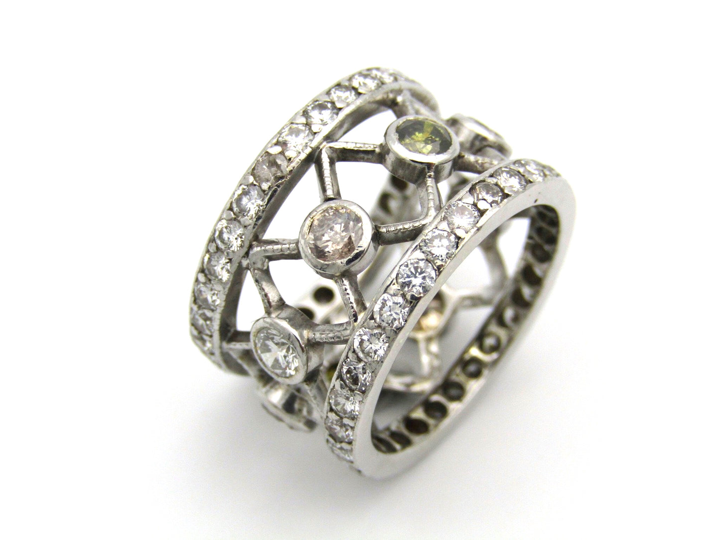 9kt gold fancy and colourless diamond ring.