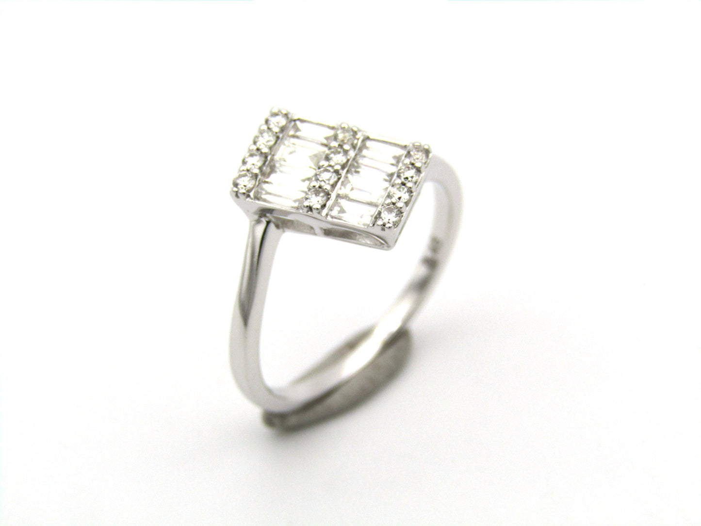 18K gold diamond ring.