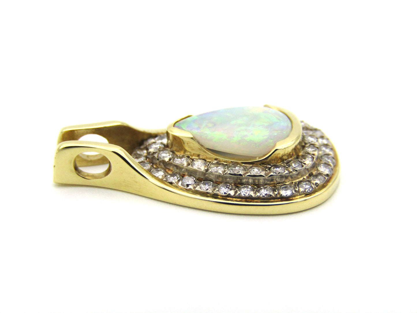 18K gold opal and diamond pendant.