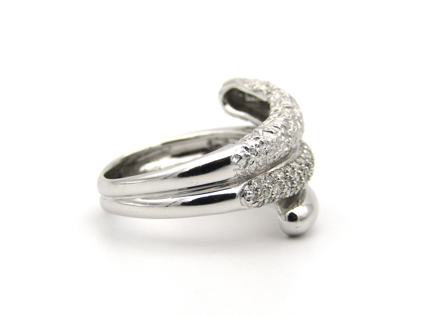 9K gold diamond twist ring.