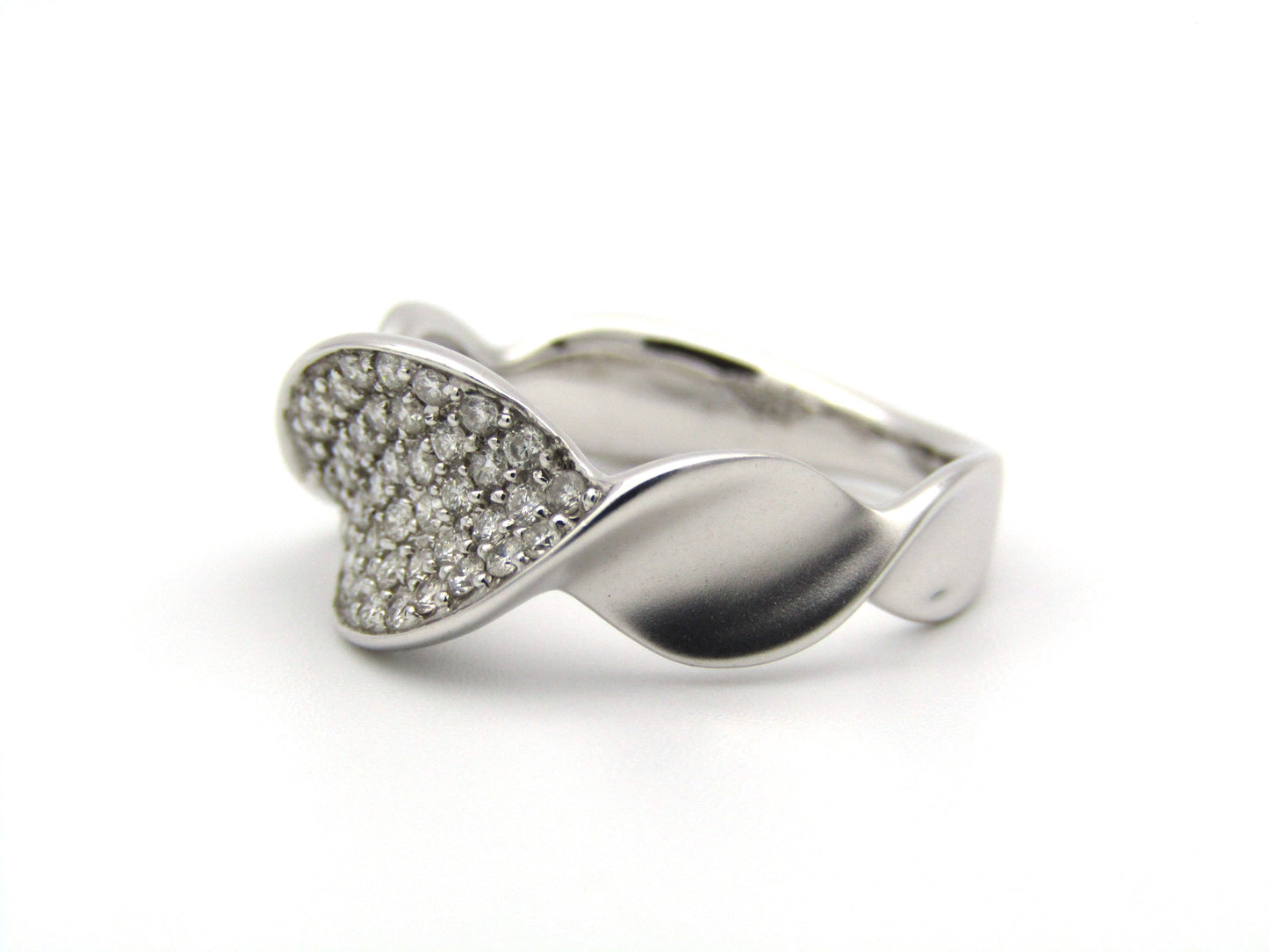 18K gold twist diamond ring.
