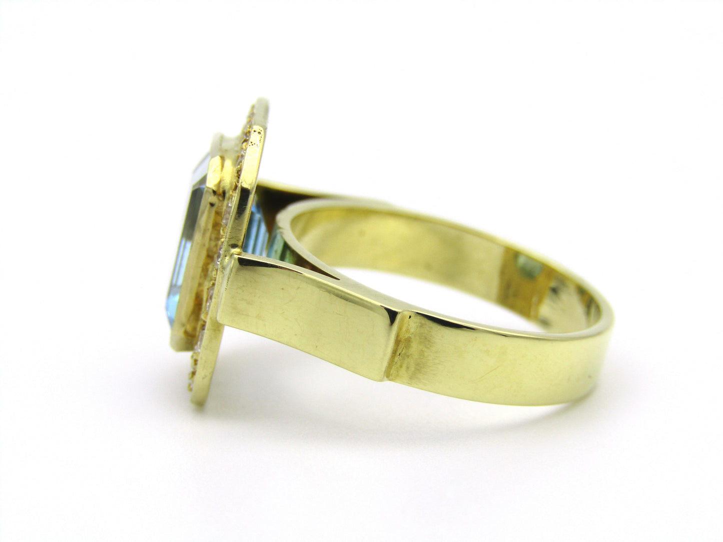 18kt yellow gold blue topaz and diamond ring.