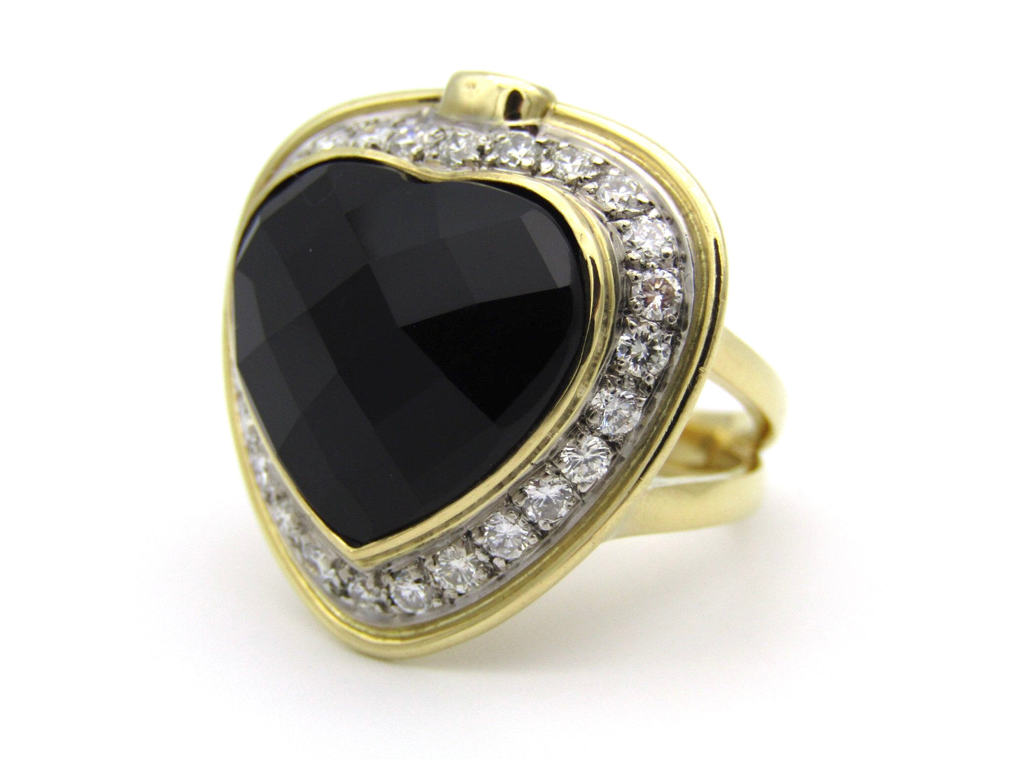 18kt gold amethyst, diamond, and ruby ring.