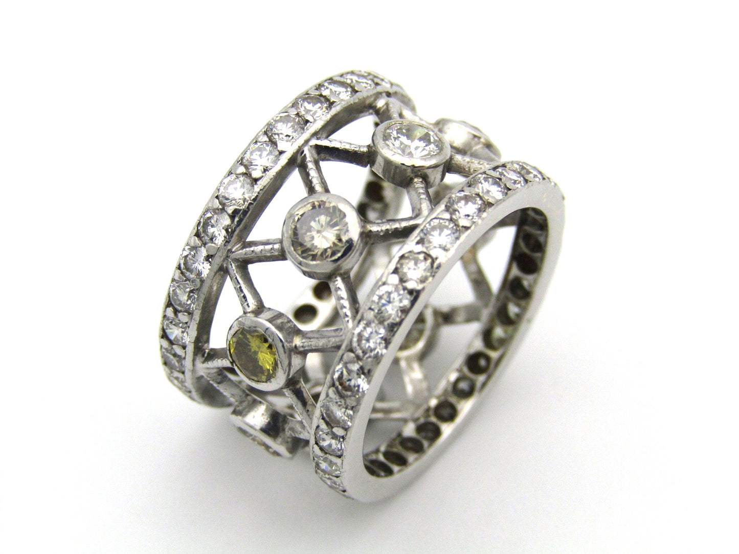 9kt gold fancy and colourless diamond ring.