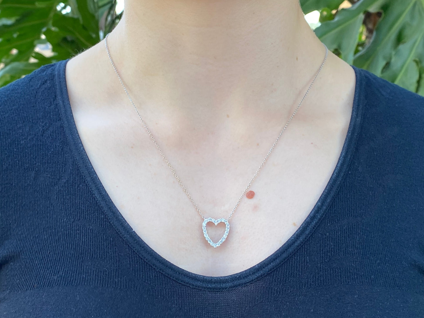 18K gold diamond heart necklace by Browns.