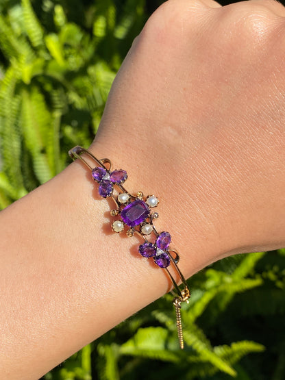 14K gold Edwardian amethyst, pearl, and diamond bangle.
