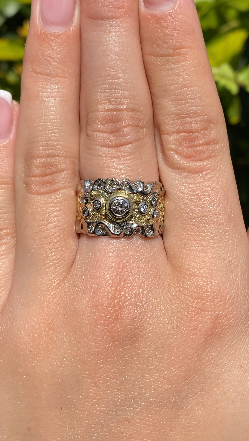 18K gold diamond ring.
