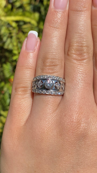 18K gold diamond ring by Jenna Clifford.