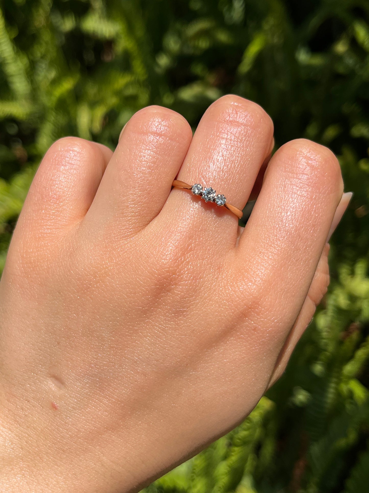 18K gold & platinum Three-stone diamond Edwardian ring, circa 1900.