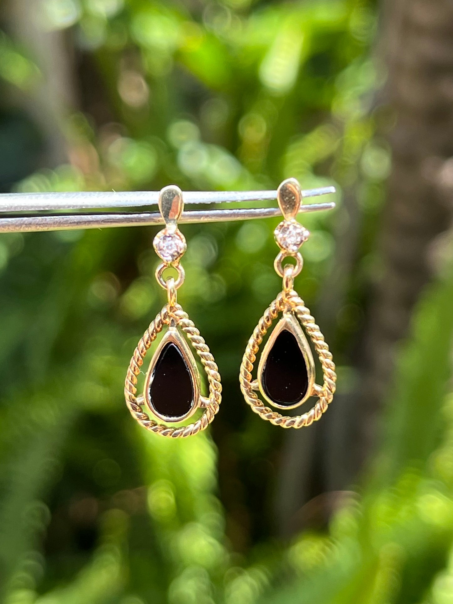 9K gold Vintage onyx and diamond dangle earrings, circa 1990's.