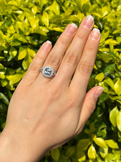 14K gold aquamarine and diamond double halo ring by Browns.