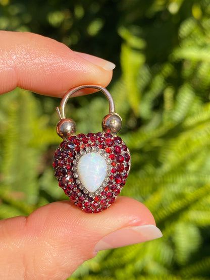 9K gold Victorian opal, garnet, seed pearl, and diamond locket and padlock clasp, circa 1850's.