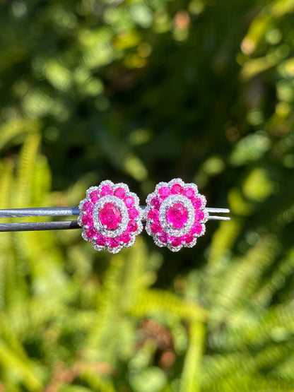 18K gold ruby and diamond earrings.