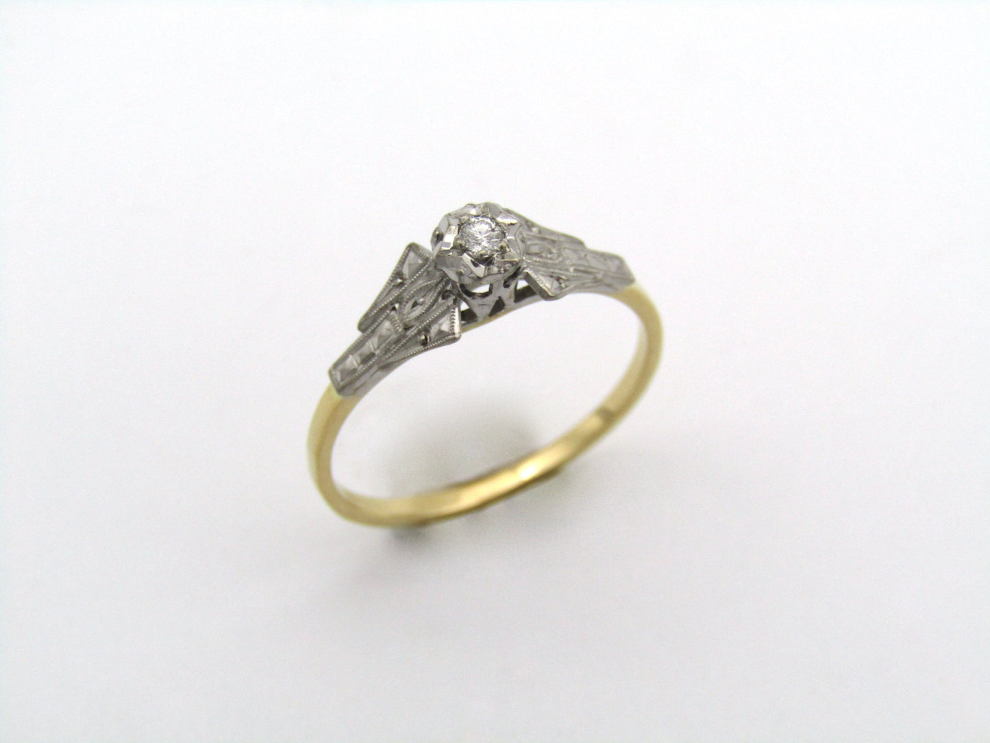 18K gold diamond ring.
