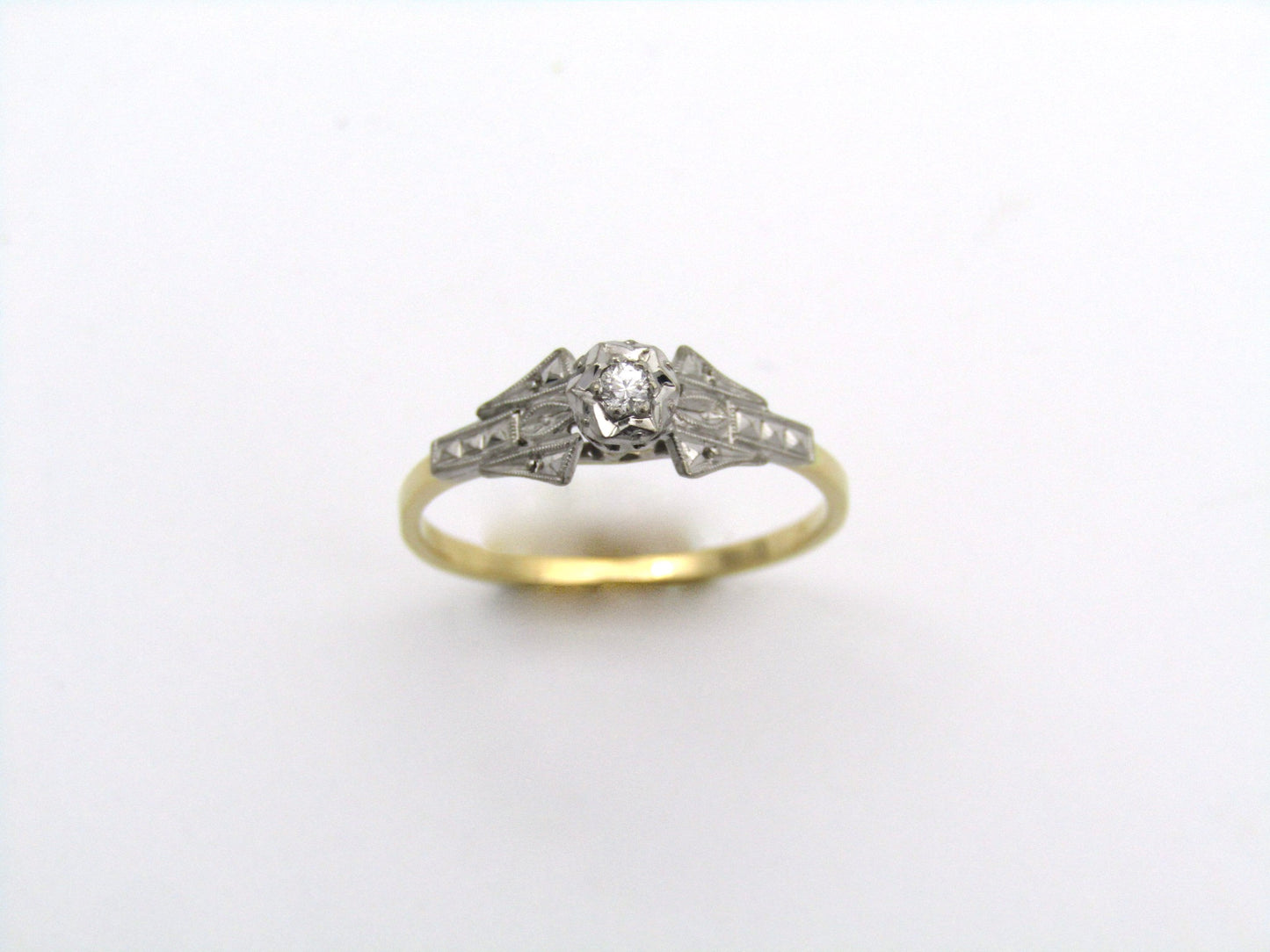 18K gold diamond ring.