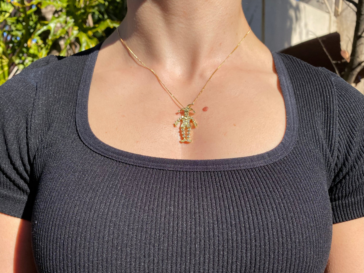18K gold articulated diamond "Jester" pendant, circa 1980.