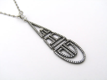 18K gold diamond Art Deco style geometric pendant.
