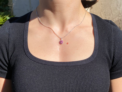 18K gold ruby and diamond pendant.