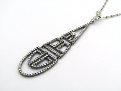 18K gold diamond Art Deco style geometric pendant.
