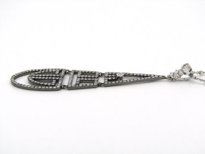 18K gold diamond Art Deco style geometric pendant.