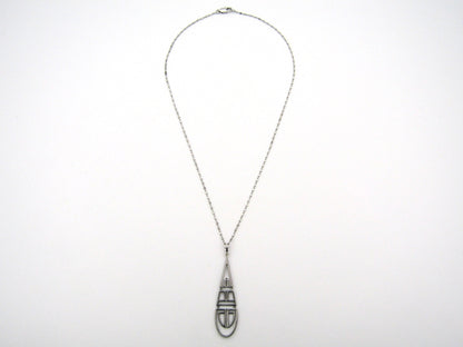 18K gold diamond Art Deco style geometric pendant.