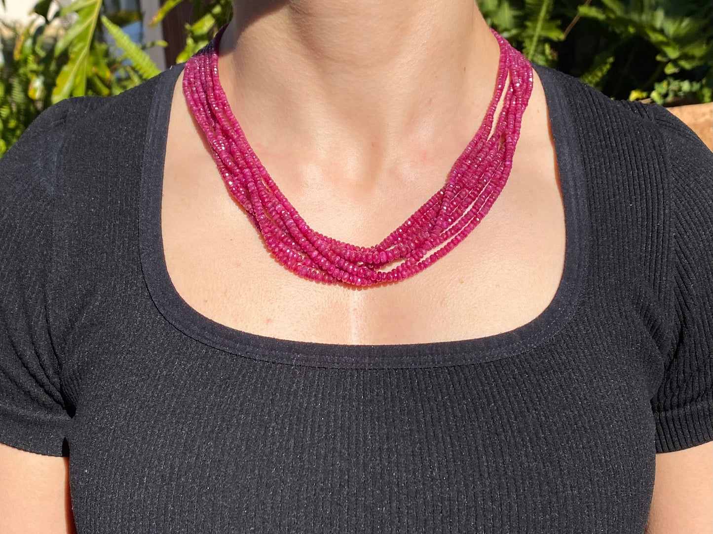 14K gold diamond and 7-strand ruby necklace.