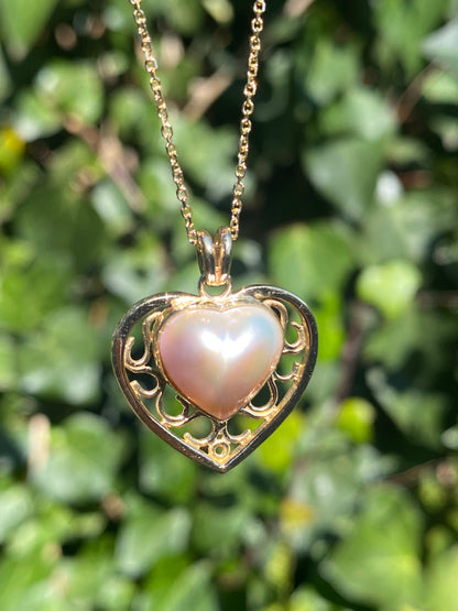 9K gold pink mabe pearl filigree heart pendant.