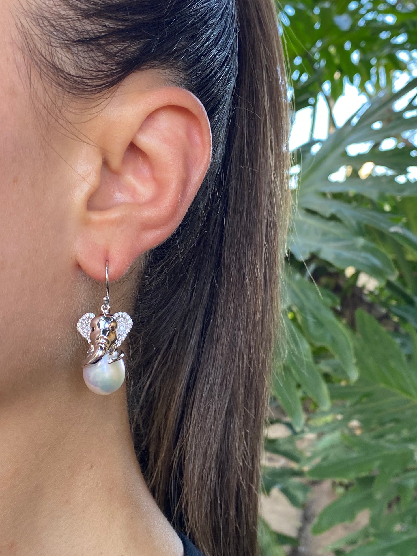 14K gold baroque pearl and diamond elephant earrings.
