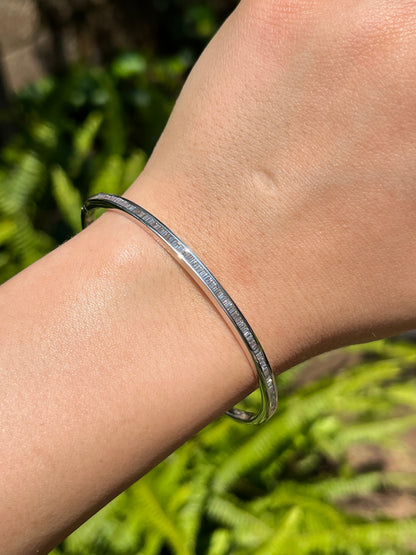 18K gold diamond bangle.