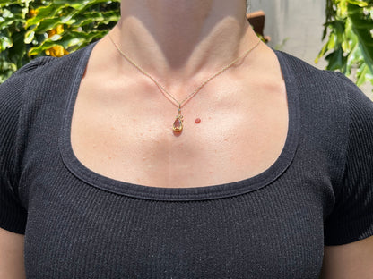 18K gold Edwardian topaz and diamond pendant, circa 1900.