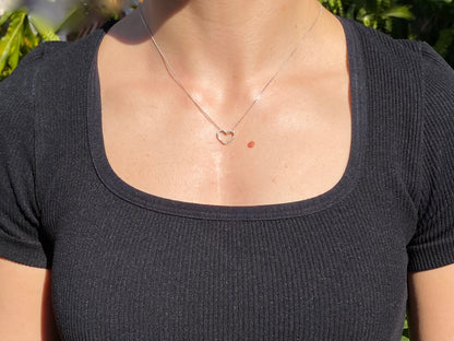 9K gold diamond heart pendant.