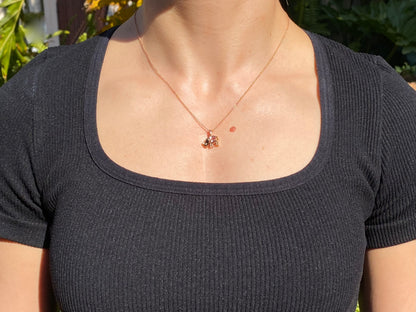 18K gold morganite and diamond rhino pendant.