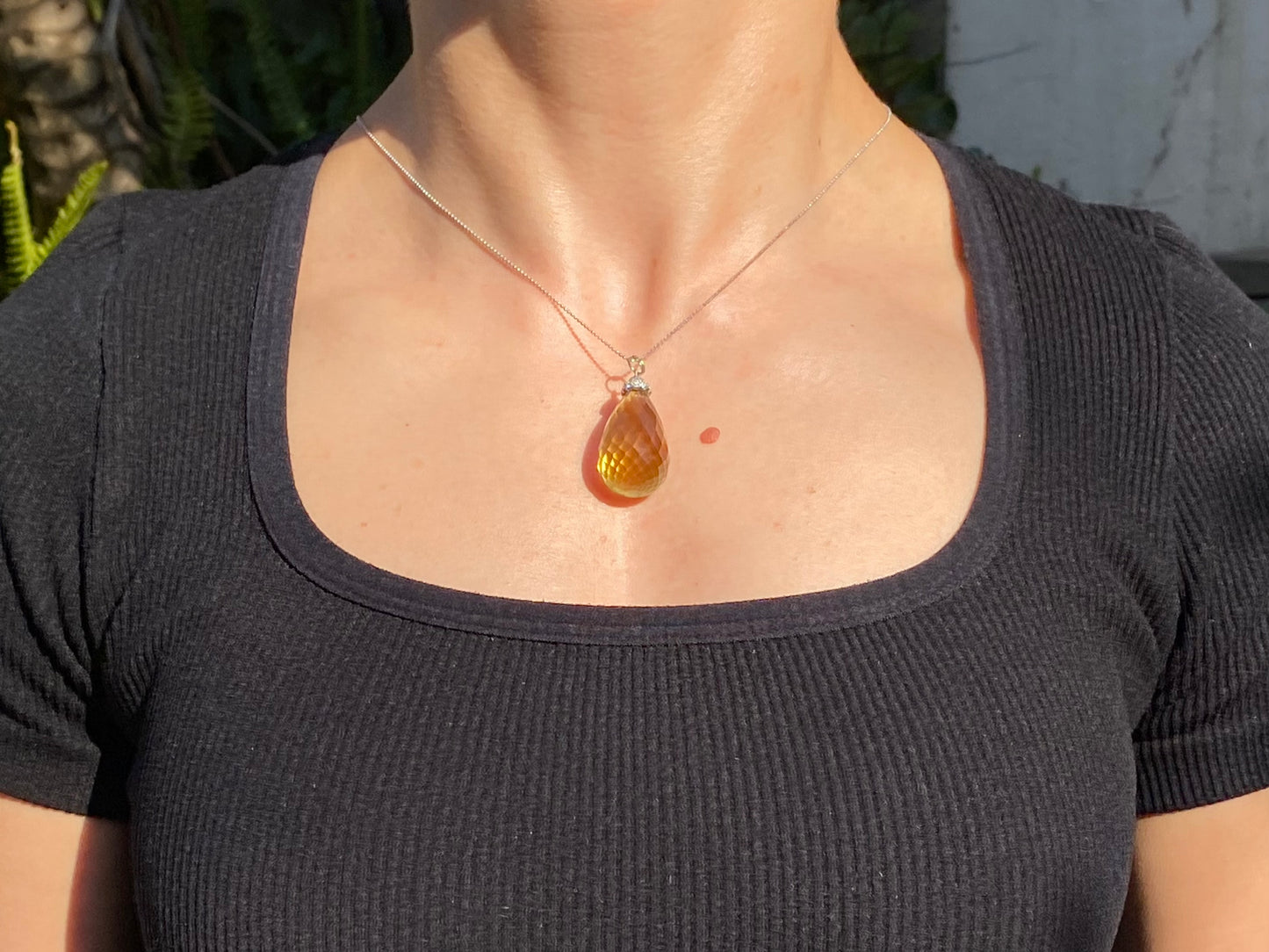 18K gold citrine and diamond pendant.