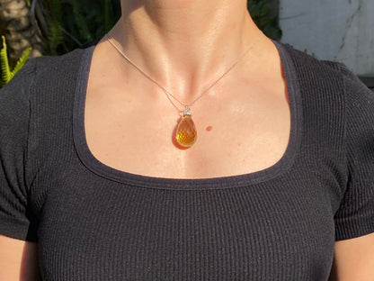 18K gold citrine and diamond pendant.