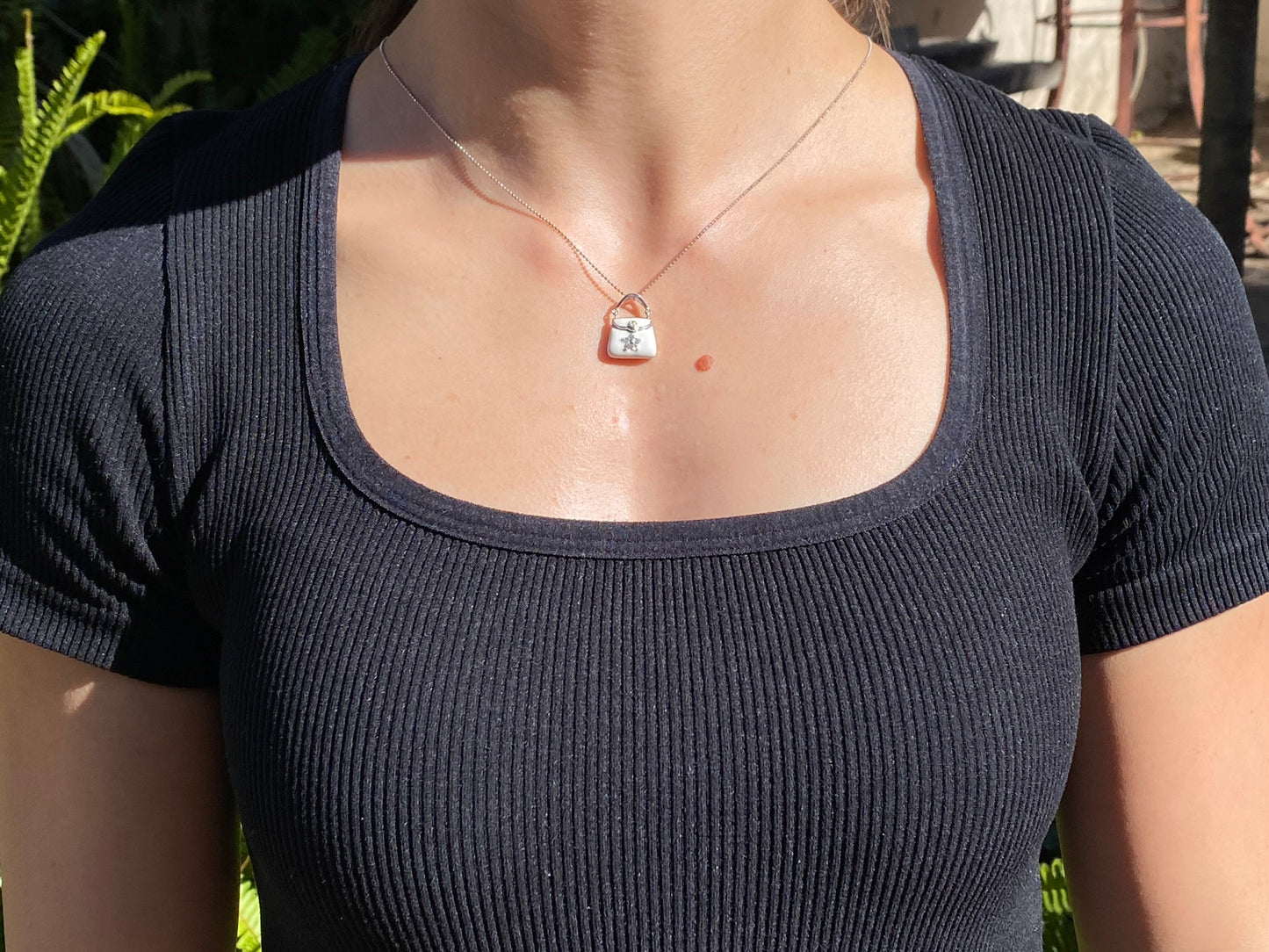 14K gold enamel and diamond handbag pendant.