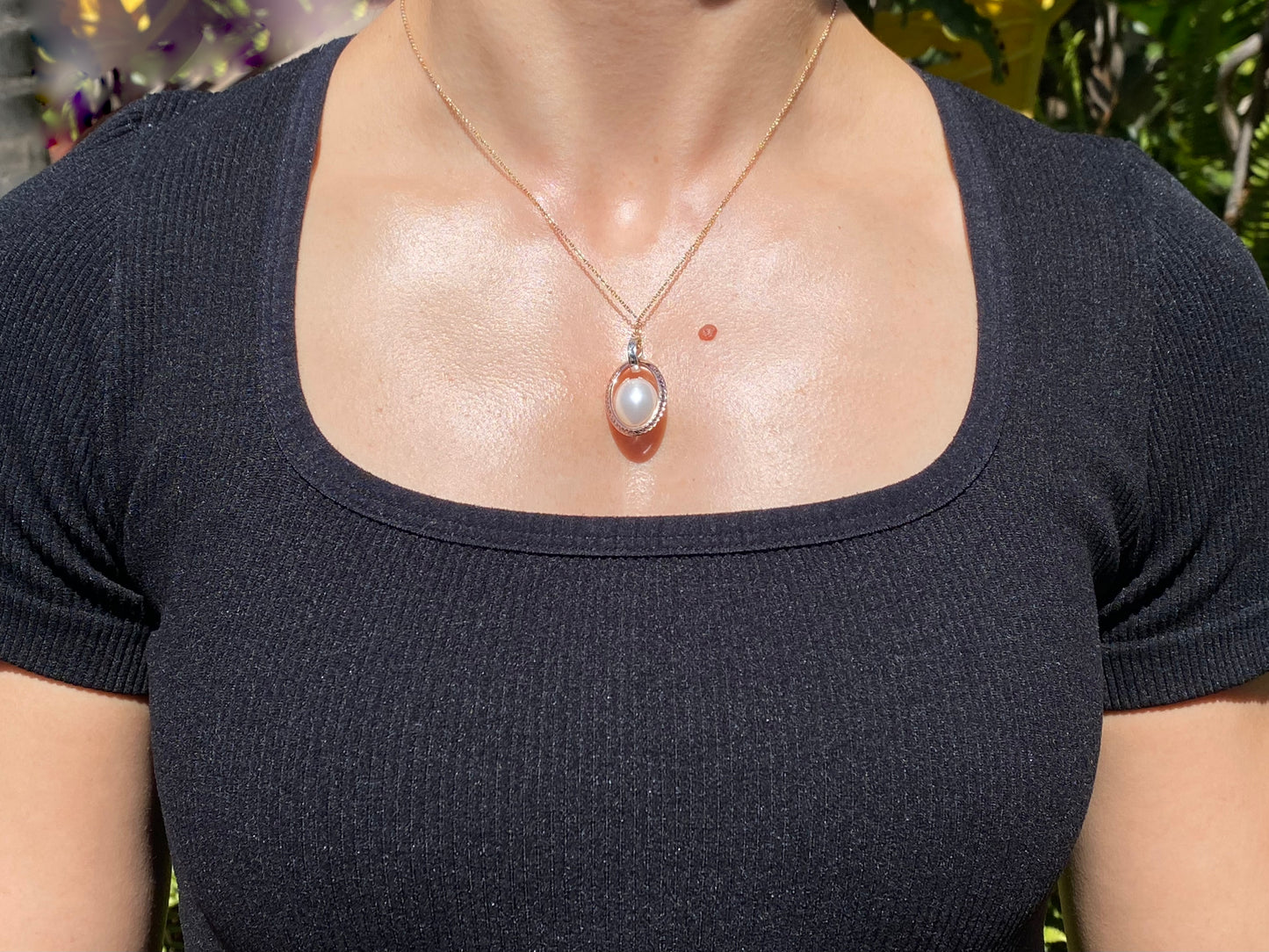 18K tri-gold freshwater pearl pendant with 18K gold chain.