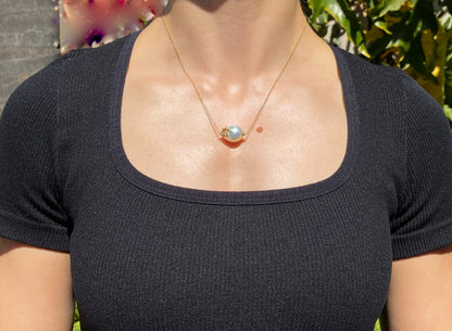 14K gold baroque pearl and diamond floating necklace.