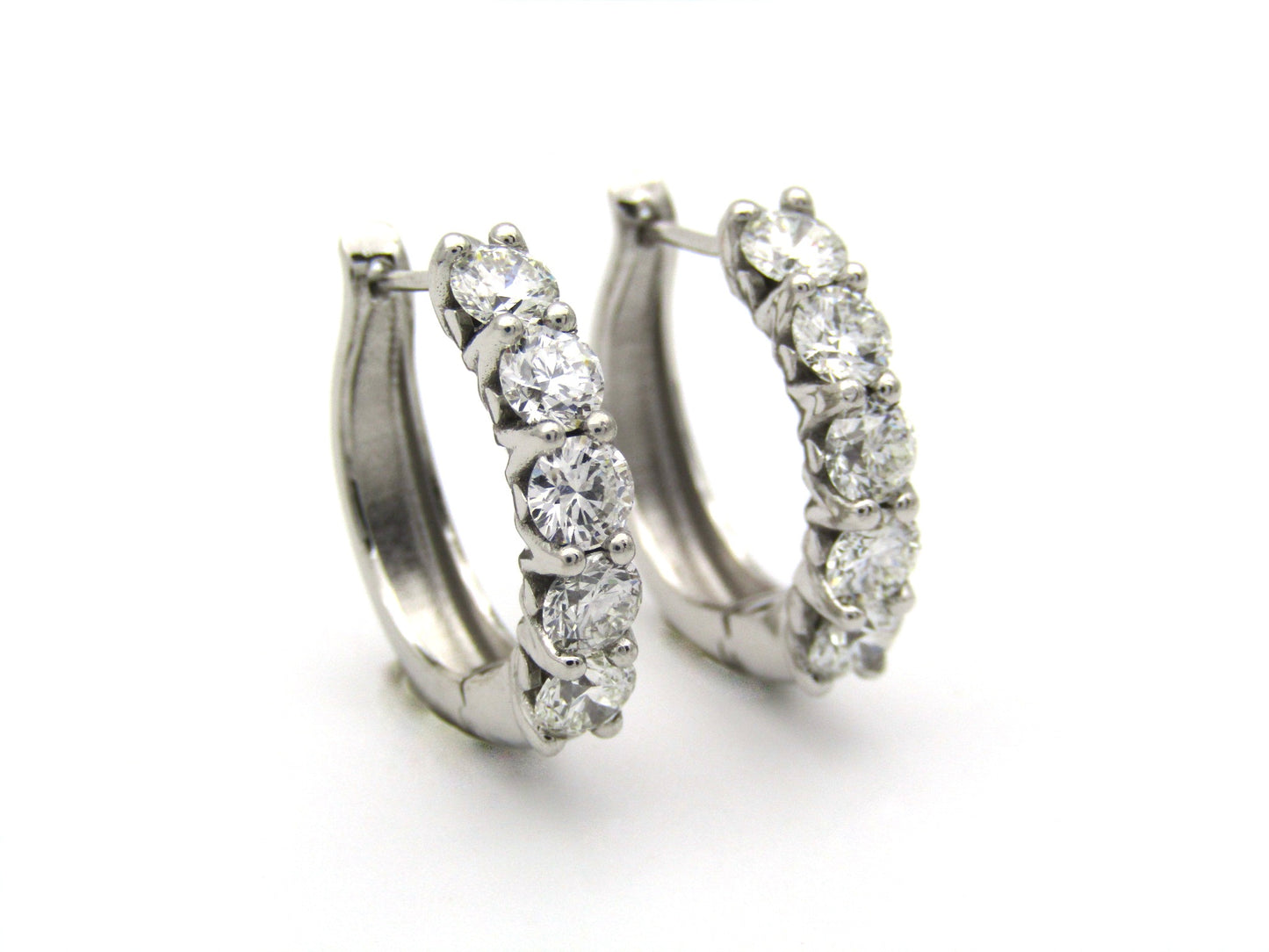 18K gold Diamond Protea huggie earrings by Browns.