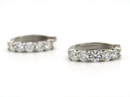 18K gold Diamond Protea huggie earrings by Browns.
