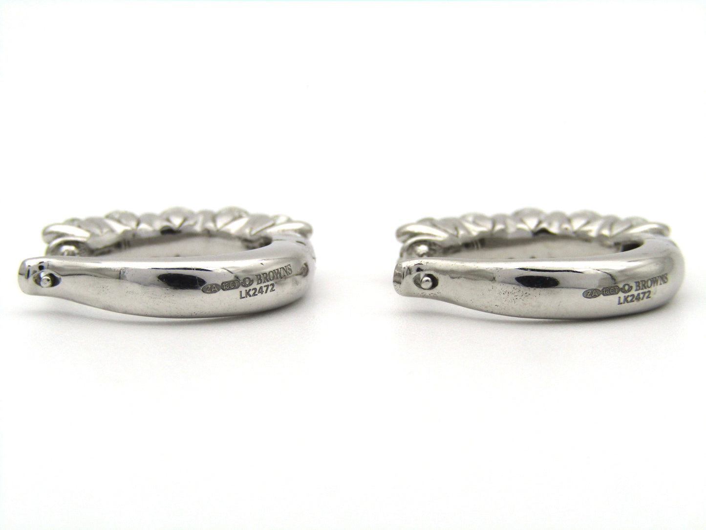 18K gold Diamond Protea huggie earrings by Browns.