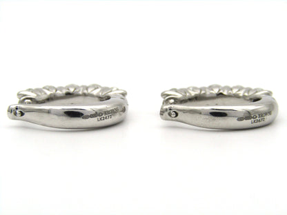 18K gold Diamond Protea huggie earrings by Browns.