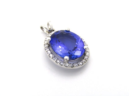 18K gold tanzanite and diamond pendant.