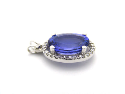 18K gold tanzanite and diamond pendant.